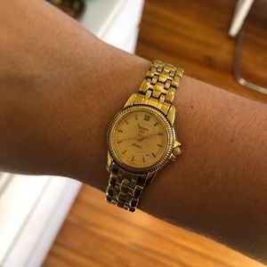 Gold tissot watch